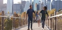 young family with daughter taking a walk on royalty free image