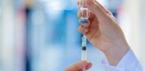 doctor preparing vaccine shot